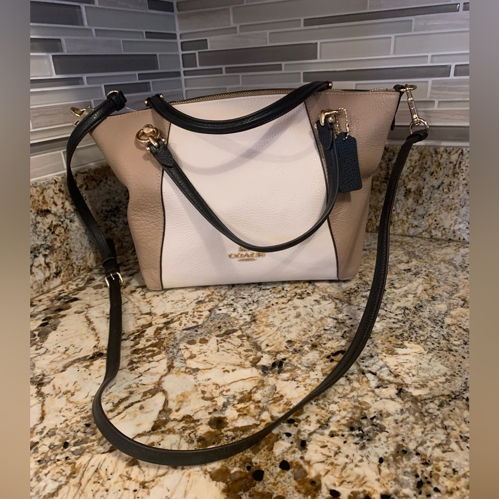 Coach tan and black crossbody purse